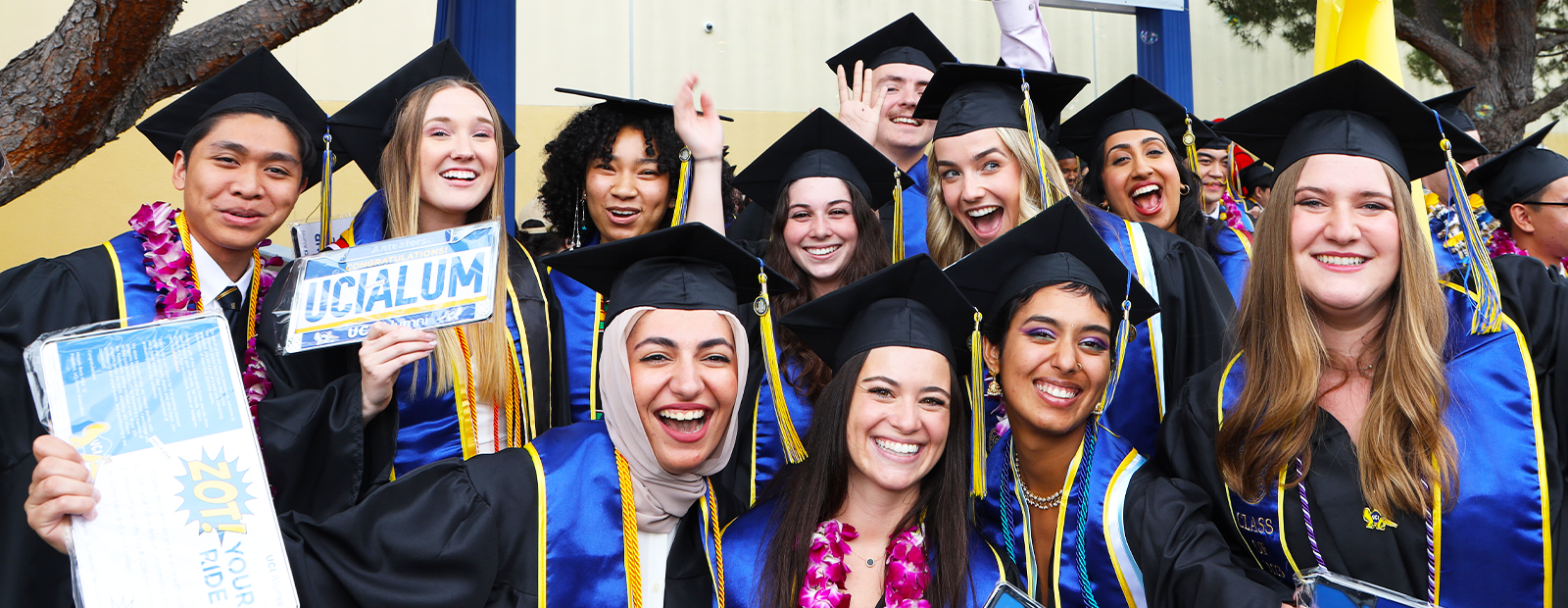 A group of grads smiling